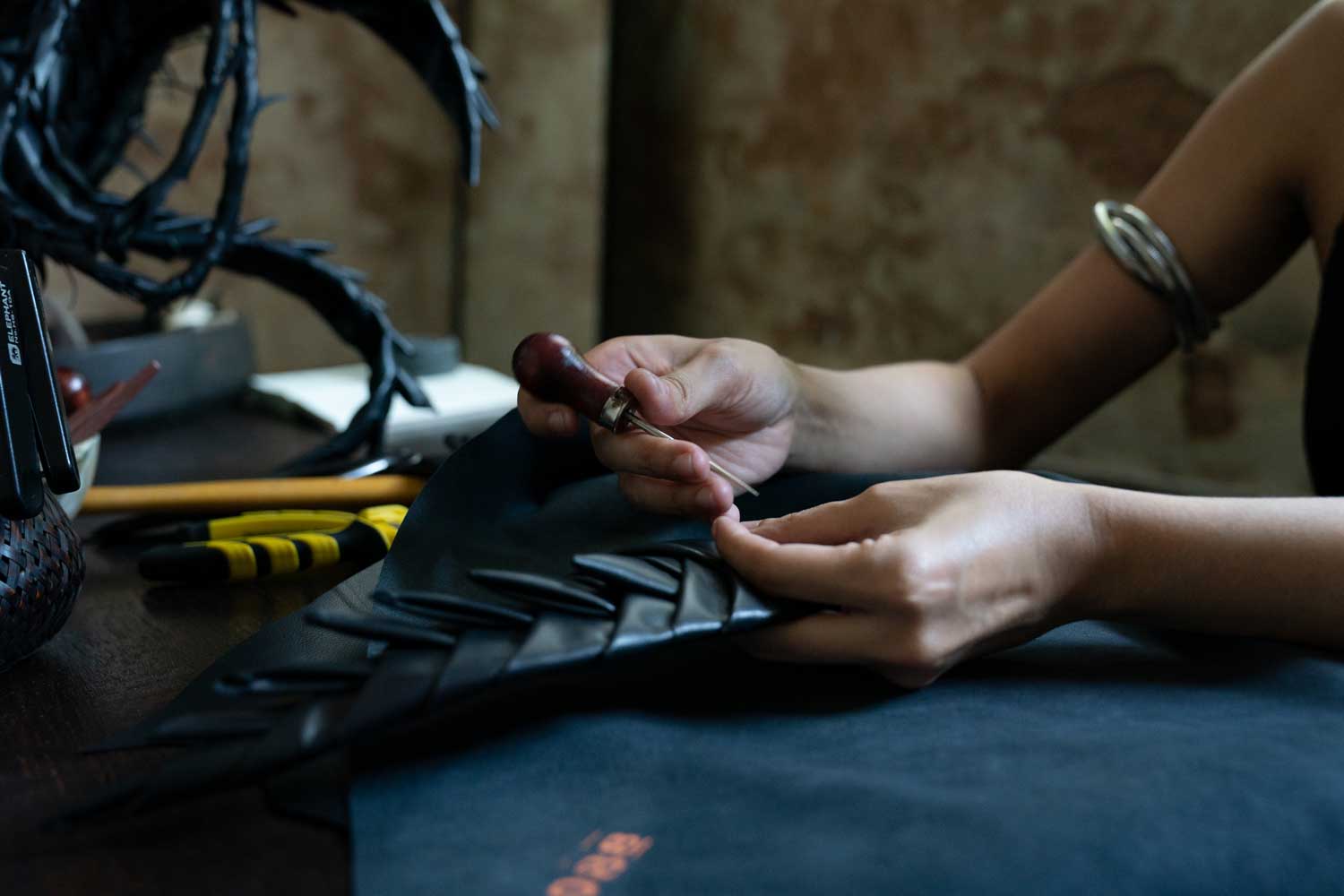 Leather artist Thyme Neelaphanakul​