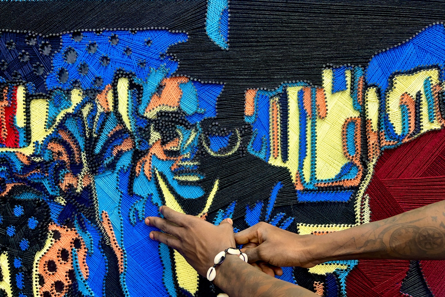 Tapestry maker Joshua Michael Adokuru