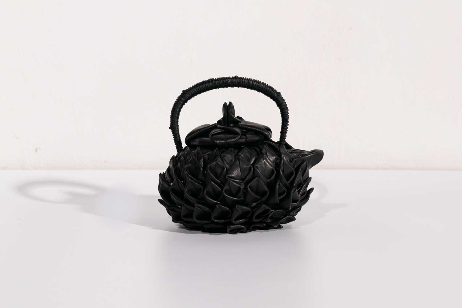 Leather artist Thyme Neelaphanakul​