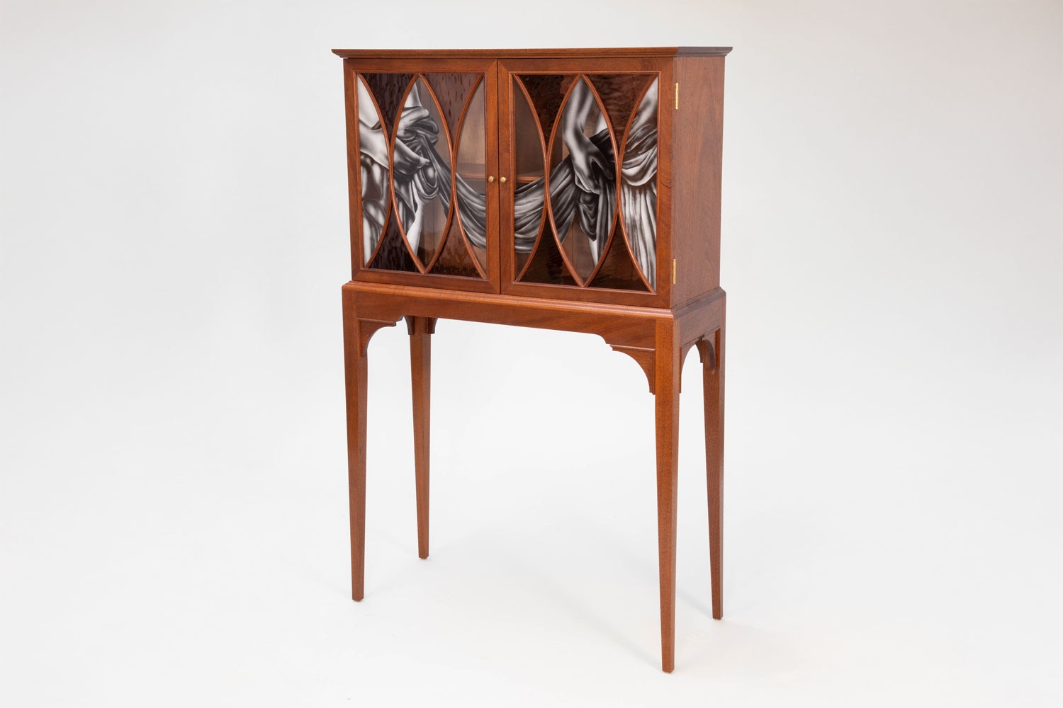 Aspen Golann A partially draped cabinet