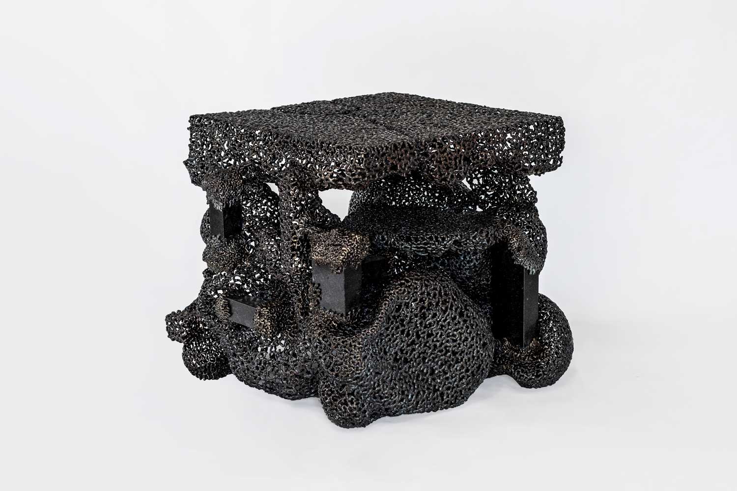 Jack Craig Black on black dripped bronze table